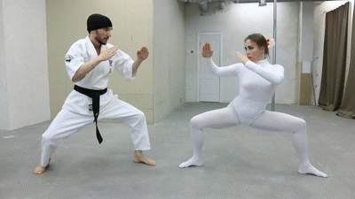 Karate ballet in white. Melanie destroys the bandits